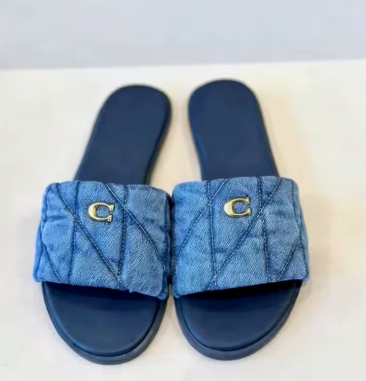 Coach flat slippers
